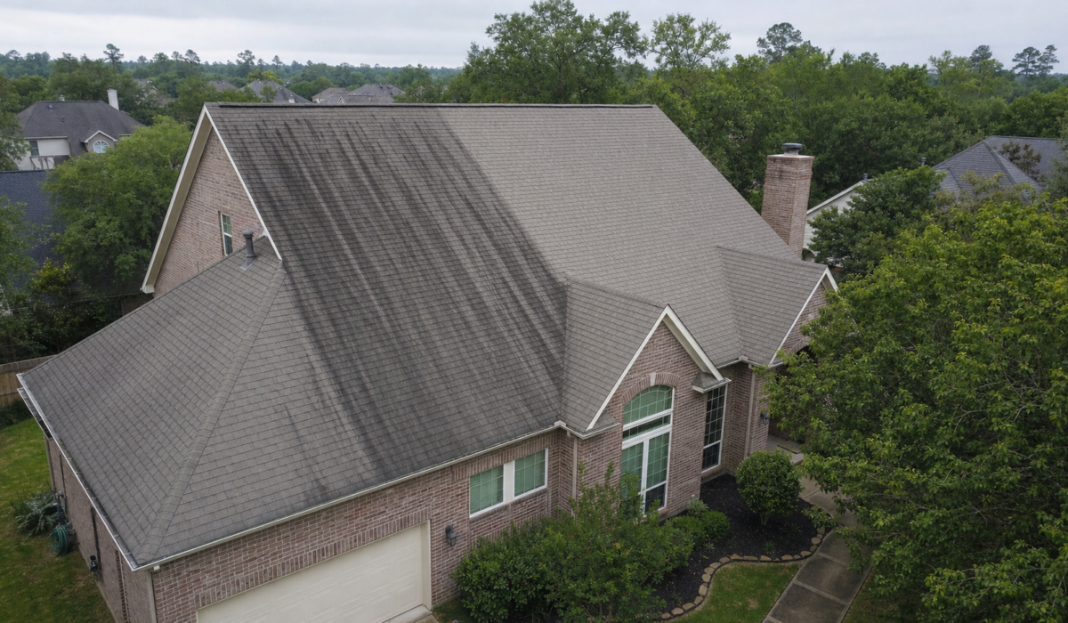 Houston algae resistant shingle roof showing dark vertical streaks on north-facing slope