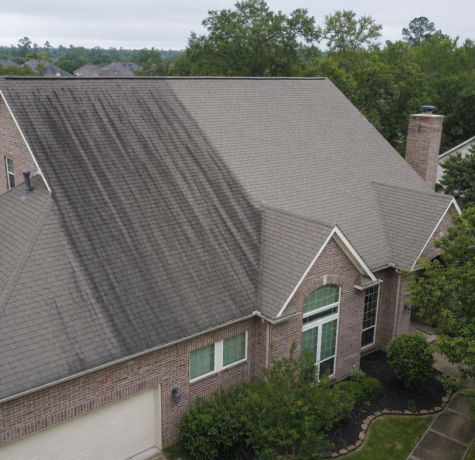 Houston algae resistant shingle roof showing dark vertical streaks on north-facing slope