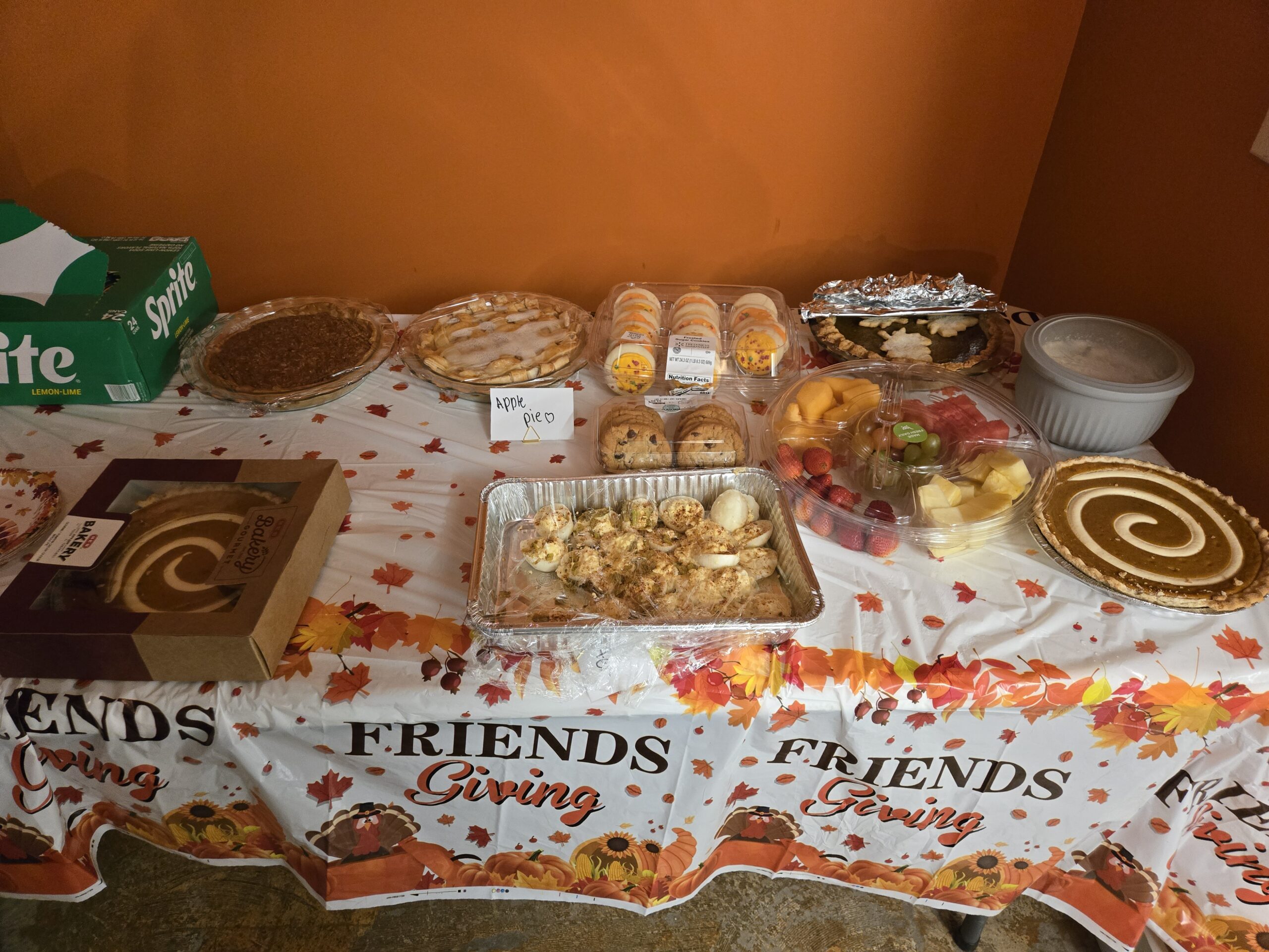 DC Pines Roofing team gathering with shared meal celebrating team culture