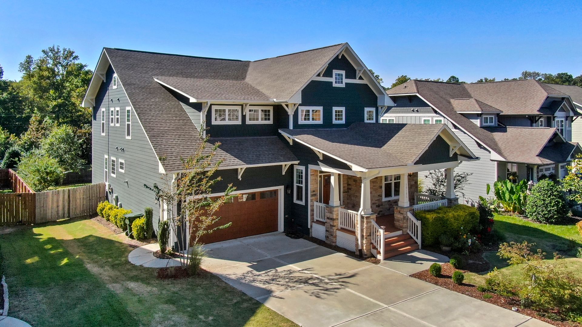 Craftsman home exterior with clean roofline and integrated gutter system