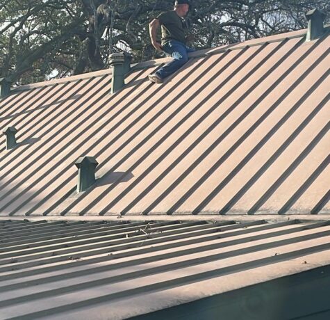 DC Pines Roofing crew member on Houston jobsite preparing for a home estimate visit