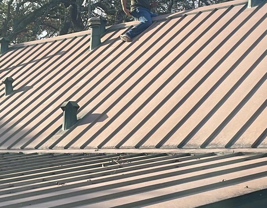 DC Pines Roofing crew member on Houston jobsite preparing for a home estimate visit