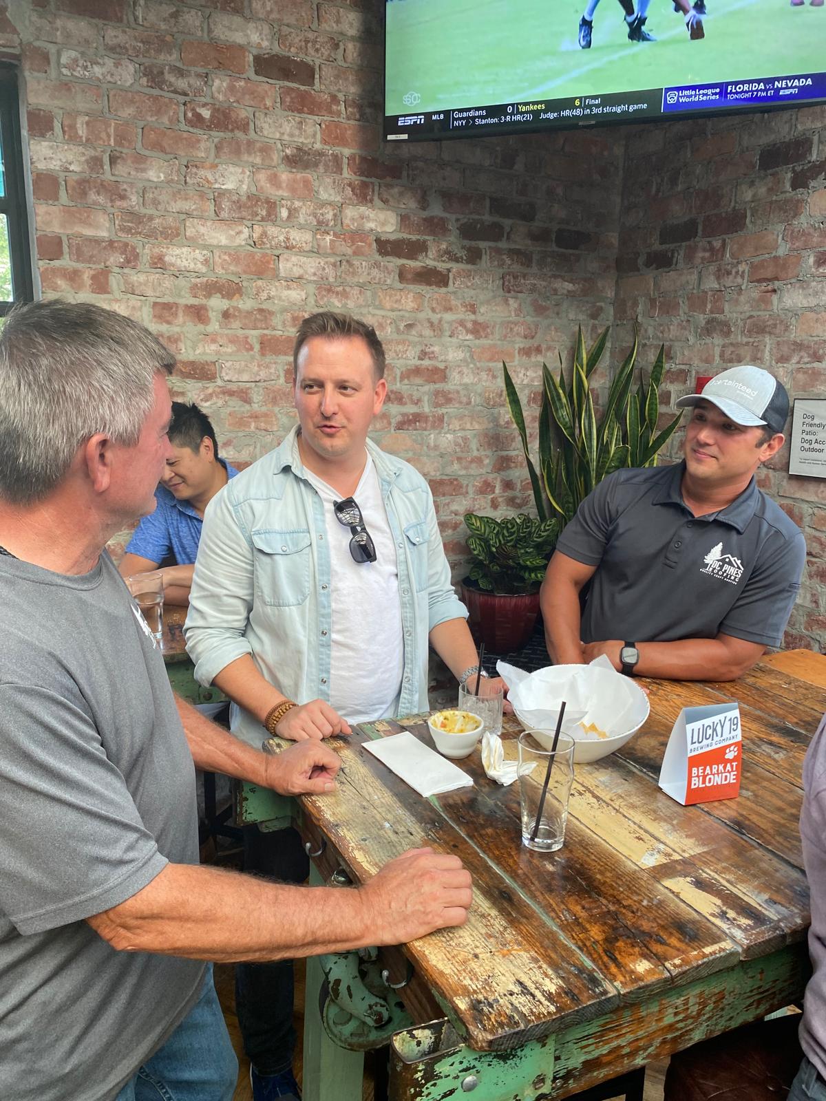 DC Pines Roofing team members gathered together in Houston