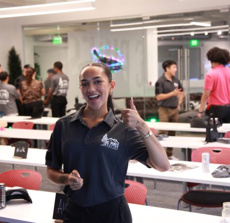 DC Pines Roofing team member in branded polo at company gathering in Houston