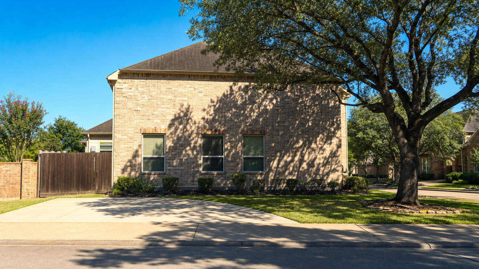 Illustration of a west-facing Houston home elevation with large sun-exposed windows in late afternoon